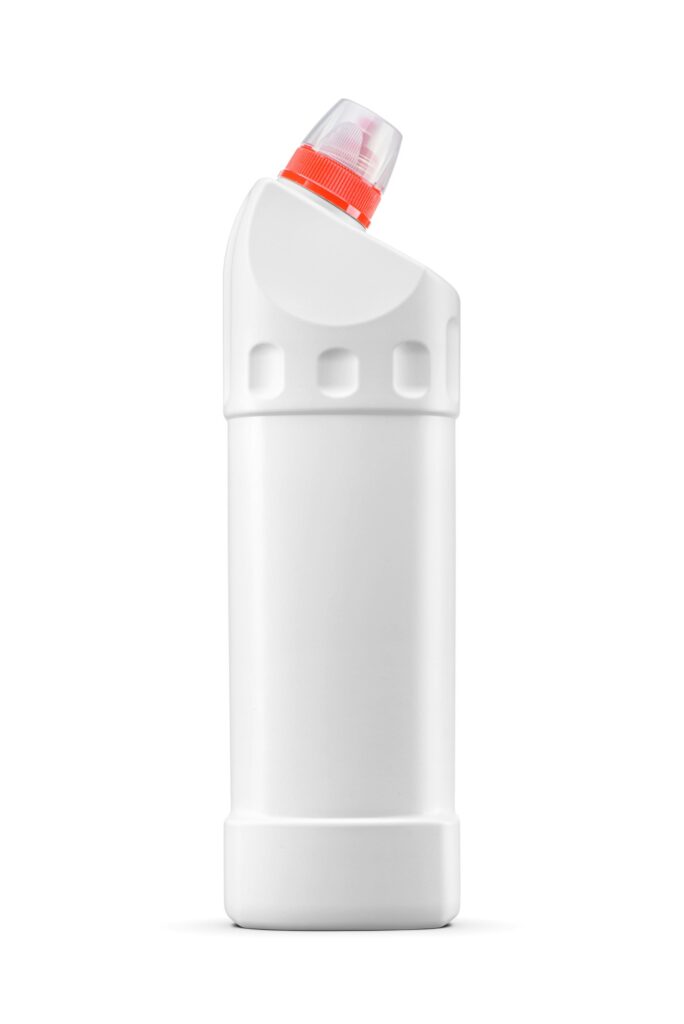 Toilet bowl cleaner bottle with red cap isolated on white.