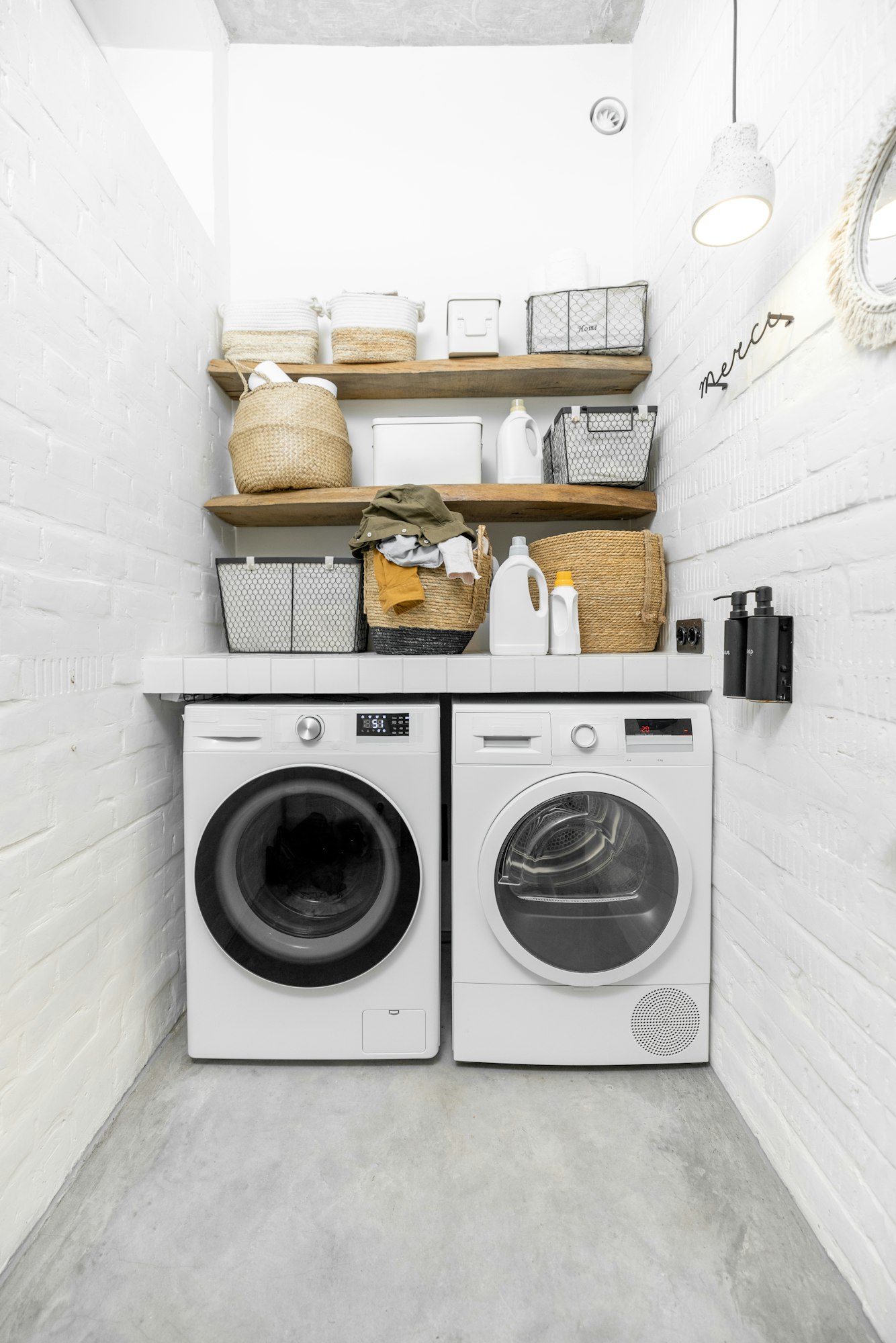 Domestic laundry room in white tones