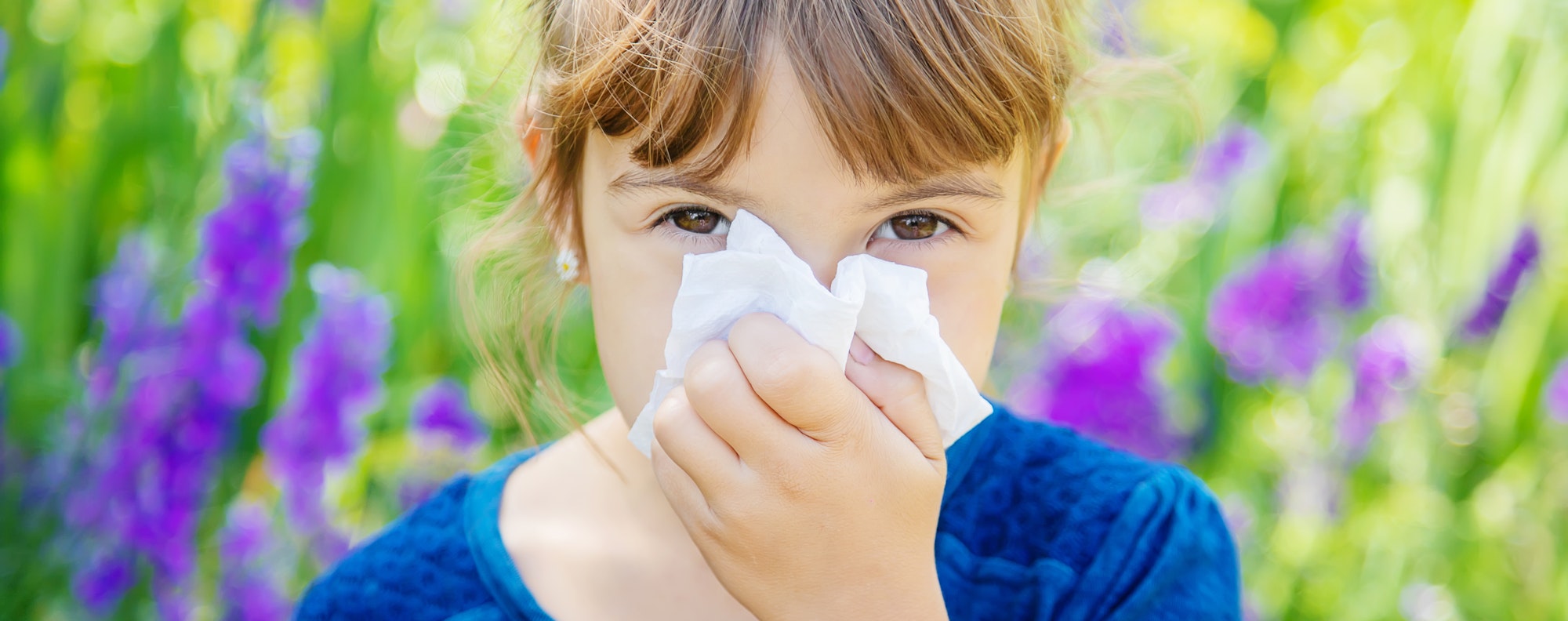 Seasonal allergy in a child. Coryza. Selective focus.